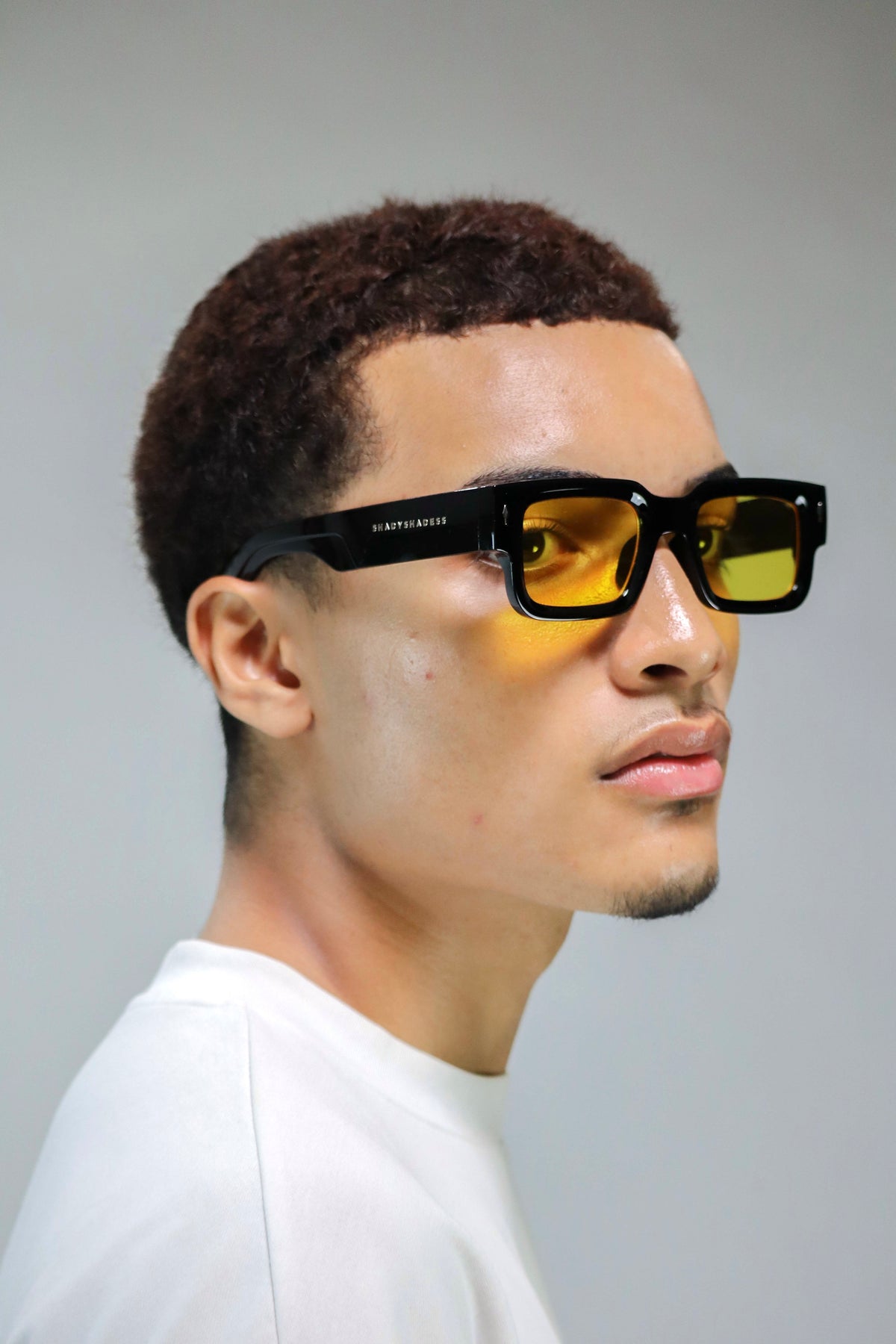 Vagos Vision black square sunglasses with geometric temples, side view